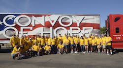 MSCA members and Convoy of Hope volunteers stand in front of a tractor-trailer full of supplies to be donated to the Palm Beach Food Bank.