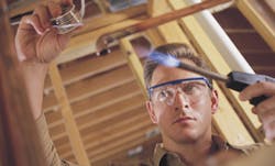 Plumber welding pipe Plumber welding pipe