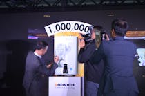 KD Navien&apos;s CEO worldwide, Joon Kee Hong, signs the actual one millionth unit during the celebration.
