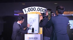 KD Navien&apos;s CEO worldwide, Joon Kee Hong, signs the actual one millionth unit during the celebration.