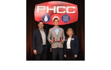 Daniel Judd of Leesburg, Virginia, is presented with the Plumbing Apprentice of the Year Award.