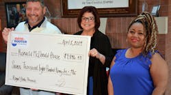 Bill Sorochak, Executive Director of the Ronald McDonald House of the Coastal Empire (left), accepts a $7,896.48 check presentation from Sherry Daniel, CEO of Roto-Rooter Plumbers of Savannah (center), and Shantina Ferguson-Waldburg, Operations Coordination Department Manager (right), from proceeds raised at the 2019 Royal Flush Casino Night.