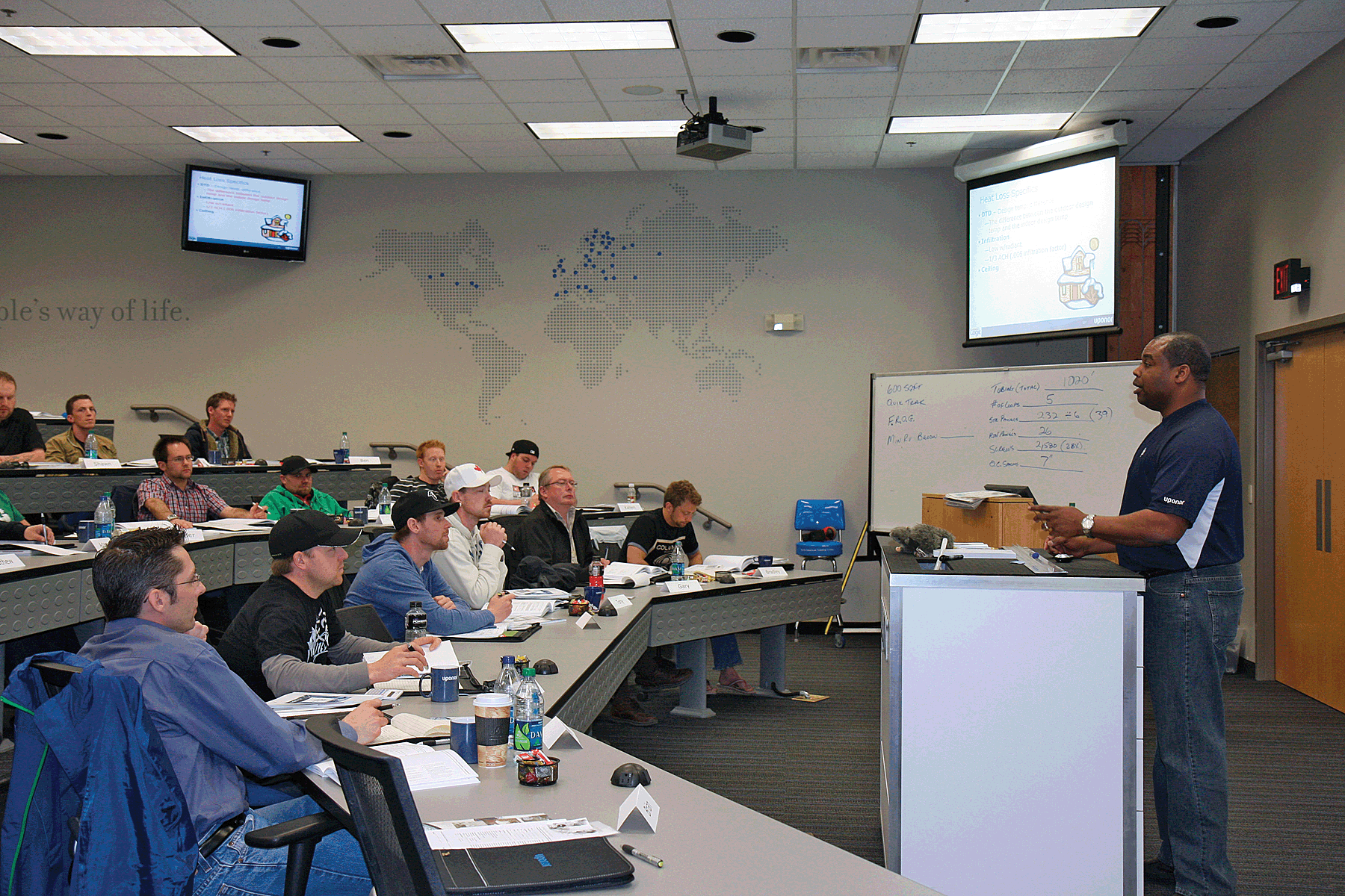 Uponor Training Manager Wes Sisco teaches professionals about radiant heating and cooling systems geothermal applications commercial plumbing systems and residential fire sprinkler systems