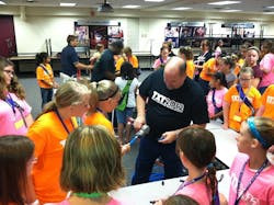Uponorrsquos Steve Swanson shows a group of girls at TXT 2012 how to make a ProPEX connection with a Milwaukee M12trade ProPEX Expansion Tool Uponorrsquos Steve Swanson shows a group of girls at TXT 2012 how to make a ProPEX connection with a Milwaukee M12trade ProPEX Expansion Tool