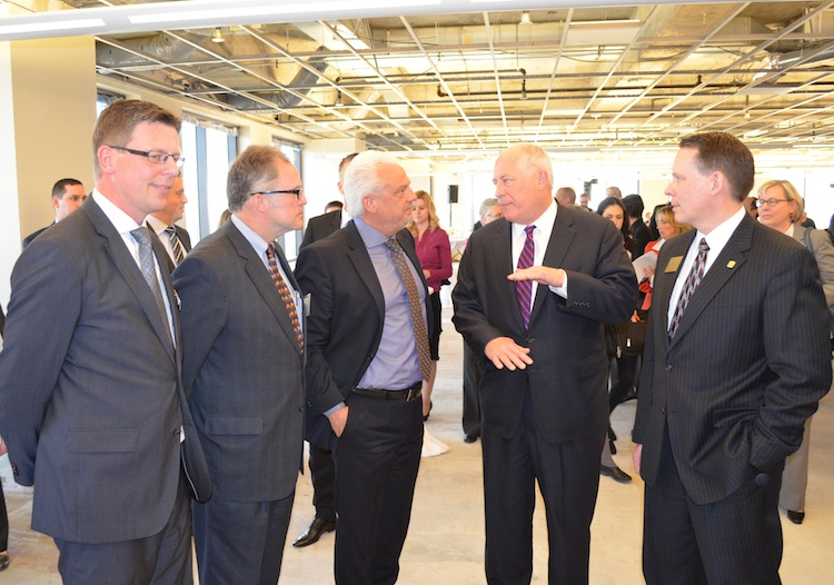 From l to r Jes Munk Hansen president of Grundfos North America Dan Cronin DuPage County Chairman Soren Sorensen Grundfos Group Executive Vice President and Chairman of the Grundfos North American Board Illinois Governor Pat Quinn and Downers Grove Mayor Martin Tully talk water conservation at the groundbreaking on April 16 2013