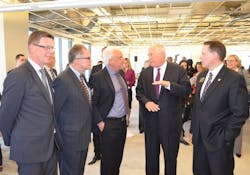 From l to r Jes Munk Hansen president of Grundfos North America Dan Cronin DuPage County Chairman Soren Sorensen Grundfos Group Executive Vice President and Chairman of the Grundfos North American Board Illinois Governor Pat Quinn and Downers Grove Mayor Martin Tully talk water conservation at the groundbreaking on April 16 2013 From l to r Jes Munk Hansen president of Grundfos North America Dan Cronin DuPage County Chairman Soren Sorensen Grundfos Group Executive Vice President and Chairman of the Grundfos North American Board Illinois Governor Pat Quinn and Downers Grove Mayor Martin Tully talk water conservation at the groundbreaking on April 16 2013