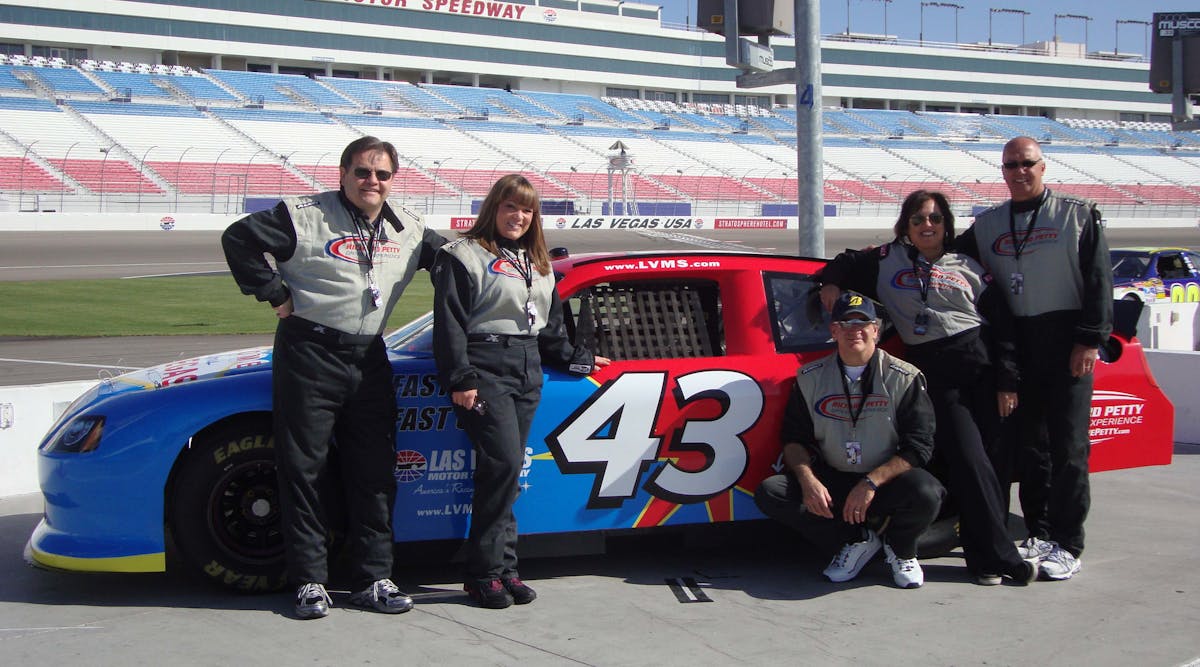Rich Diesel (right) and his wife Marci (next to him), share a proud moment at Richard Petty Driving Experience in Las Vegas, NV with Taco Trainer John Barba (next to Marci), Kim Ziner from Emerson-Swan, and Taco&rsquo;s VP of Eastern Regional Sales, Ken Andersen. Rich Diesel won Taco&apos;s &ldquo;Just Your Speed!&rdquo; promotion.