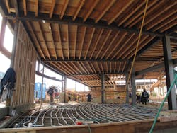 The ground floor features inslab radiant The ground floor features inslab radiant