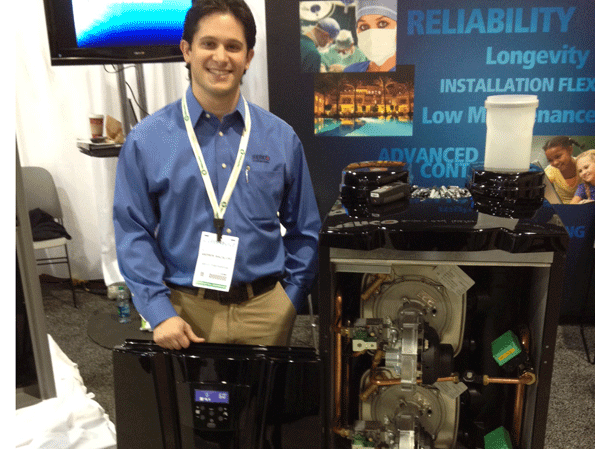 Aerco Product Solutions Manager Andrew Macaluso with the AM Series boiler