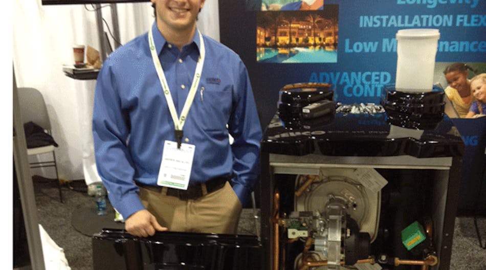 Aerco Product Solutions Manager Andrew Macaluso with the AM Series boiler.