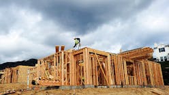 A construction worker builds a new home at the Rosedale master planned community in Azusa, California.