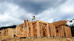 A construction worker builds a new home at the Rosedale master planned community in Azusa, California.