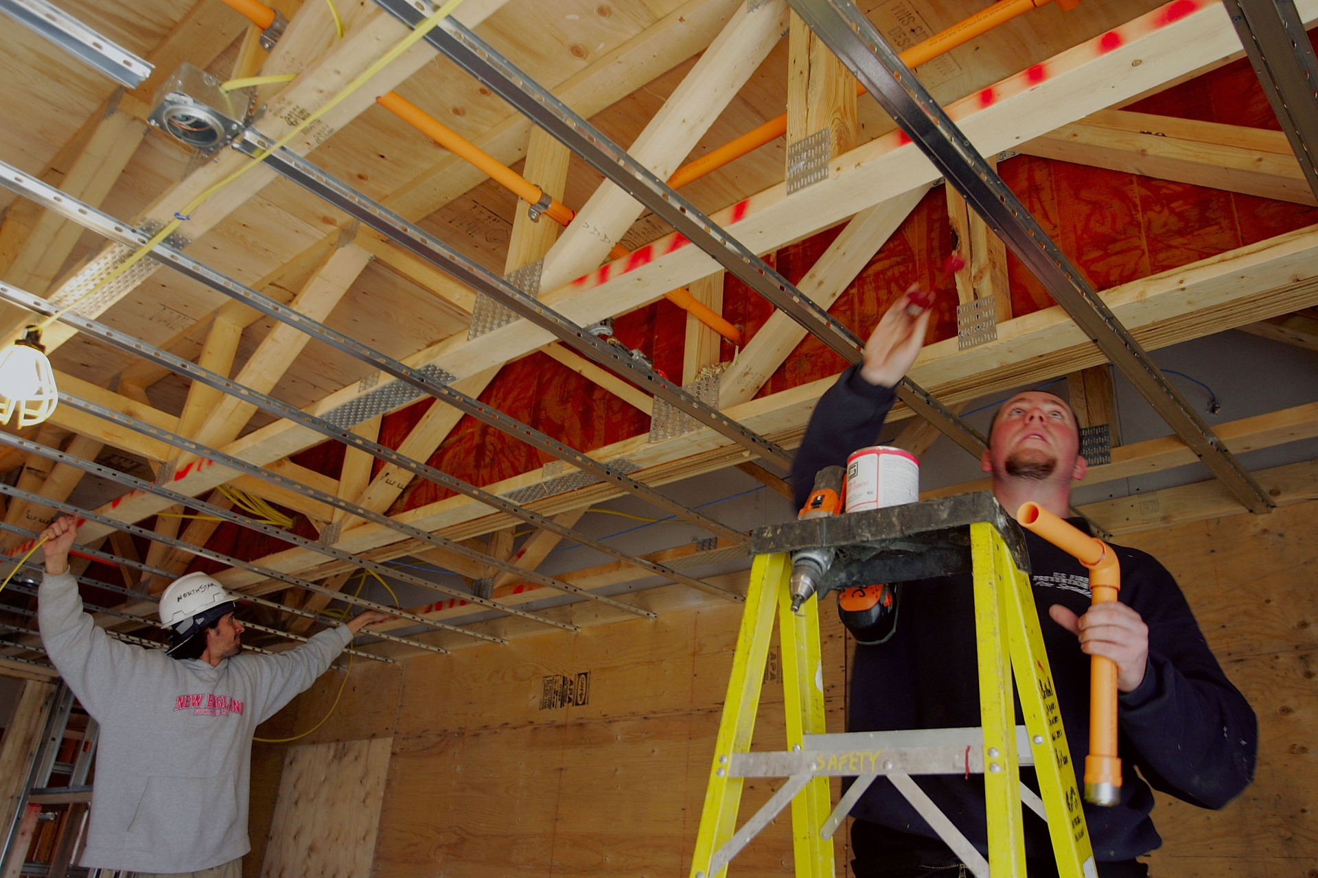 Stephen MastersonR works on installing a fire sprinkler system at a construction site April 19 2006 in Nantucket Massachusetts Copyright 2006 Getty Images