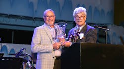 Mark Giebelhaus (left) receives the Col. Scott Award from PHCC President Steve Rivers.