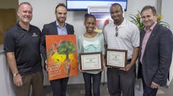 Children&apos;s Art Contest Grand Prize Winner Aniela Edwards of Fort Lauderdale, FL (center) holds her framed winner&apos;s certificate in the company of (left to right) Rich Ouellette, Senior County Director for the Levine/Slaughter Boys &amp; Girls Club of North Lauderdale, FL, which sponsored her entry, Vitor Gregorio, incoming President of Bosch Thermotechnology, art teacher Gregory Johnson of the Levine/Slaughter Boys &amp; Girls Club, and Richard Soper, retiring President of Bosch Thermotechnology. Not pictured is Darren Edwards, Aniela&apos;s father who accompanied her to the ward presentation at Bosch Thermotechnology&apos;s Fort Lauderdale facility.