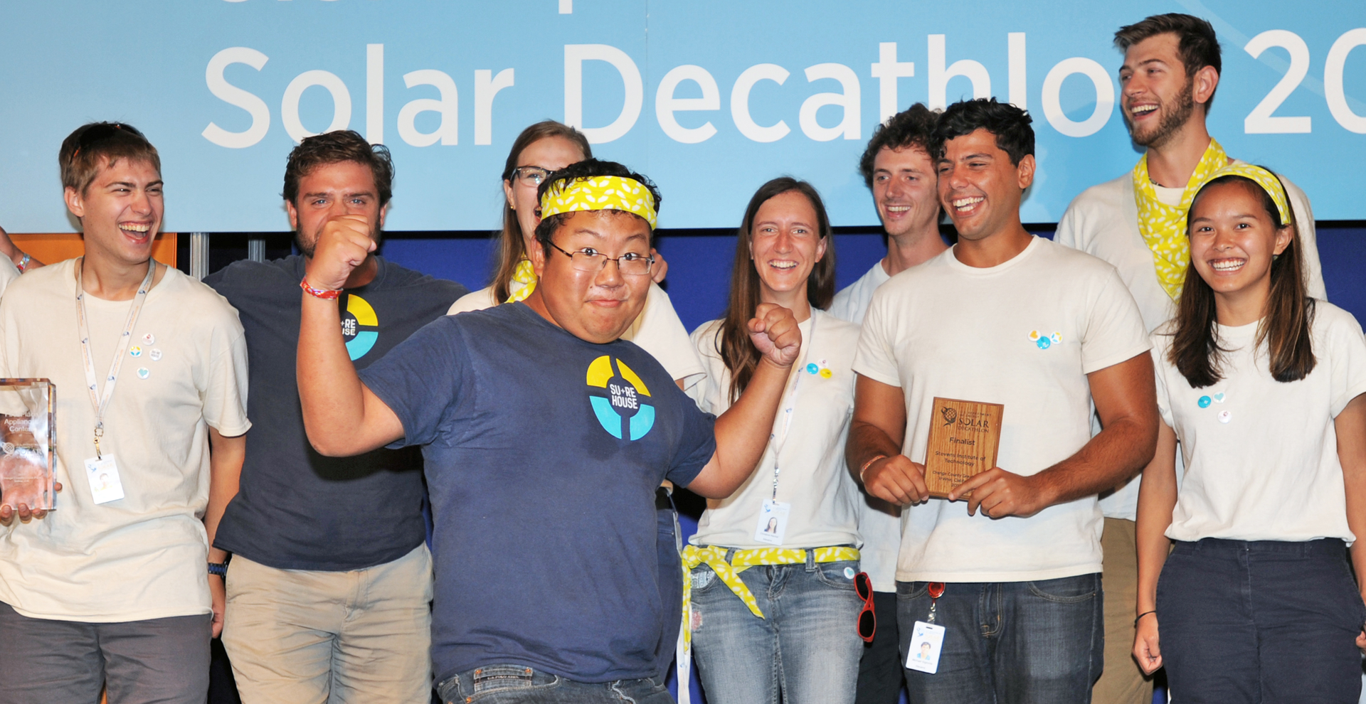 Paul Ahn of Stevens Institute of Technology leads a team cheer onstage at the US Department of Energy Solar Decathlon 2015 Sunday October 18 2015 at the Orange County Great Park Irvine California