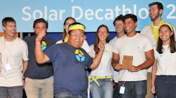 Paul Ahn of Stevens Institute of Technology leads a team cheer onstage at the U.S. Department of Energy Solar Decathlon 2015, Sunday October 18, 2015, at the Orange County Great Park, Irvine, California.