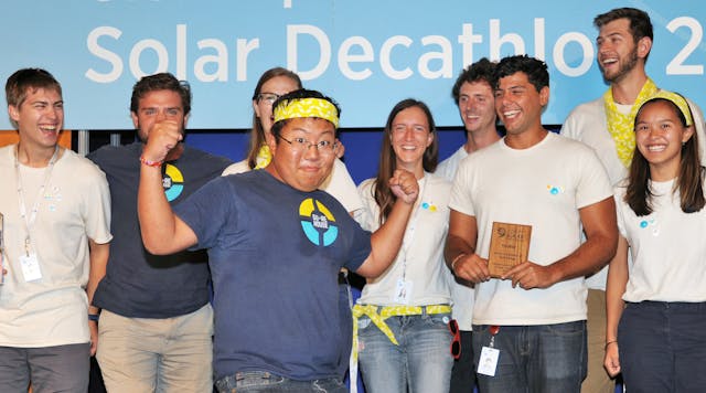 Paul Ahn of Stevens Institute of Technology leads a team cheer onstage at the U.S. Department of Energy Solar Decathlon 2015, Sunday October 18, 2015, at the Orange County Great Park, Irvine, California.