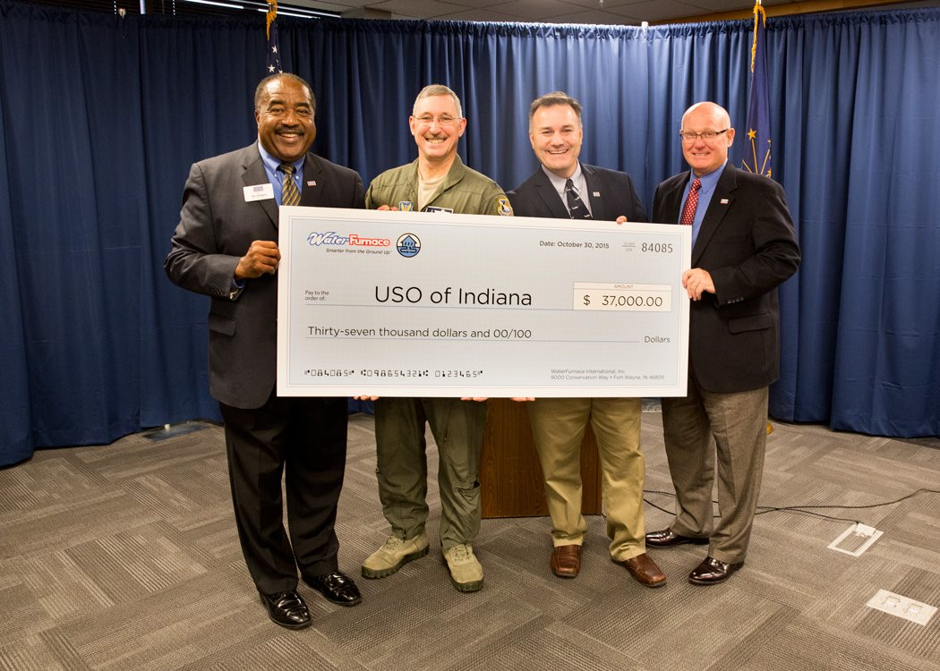 Carl Huber WaterFurnace vice president of corporate quality presented the check during an Oct 30 news conference at the companyrsquos corporate headquarters in Fort Wayne Ind From left to right Jim Pridgin of the USO Col Patrick Renwick of the 122nd Fighter Wing Charles Ridings of the USO and Bob Legacy of the USO