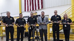 Members of the DeWalt executive team at the board cutting ceremony.