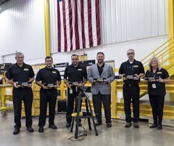 Members of the DeWalt executive team at the board cutting ceremony Members of the DeWalt executive team at the board cutting ceremony