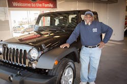James Blue senior service technician with Wade Hardin Plumbing poses next to his new Jeep Wrangler James Blue senior service technician with Wade Hardin Plumbing poses next to his new Jeep Wrangler