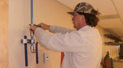 A Haberberger technician takes part in the extensive renovations at St. Louis University.