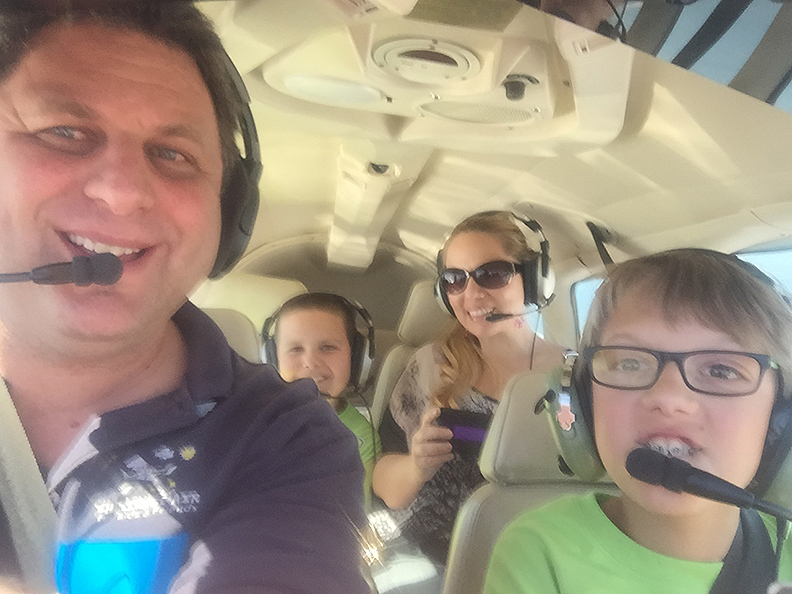 Taking flight are copilot Sean Lindsey along with his mom Elizabeth Alvarez Lindsey and brother Brandon Lindsey with the help of pilot Abraham Talerman