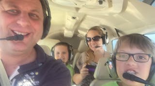 Taking flight are co-pilot Sean Lindsey, along with his mom Elizabeth Alvarez Lindsey and brother Brandon Lindsey, with the help of pilot Abraham Talerman.