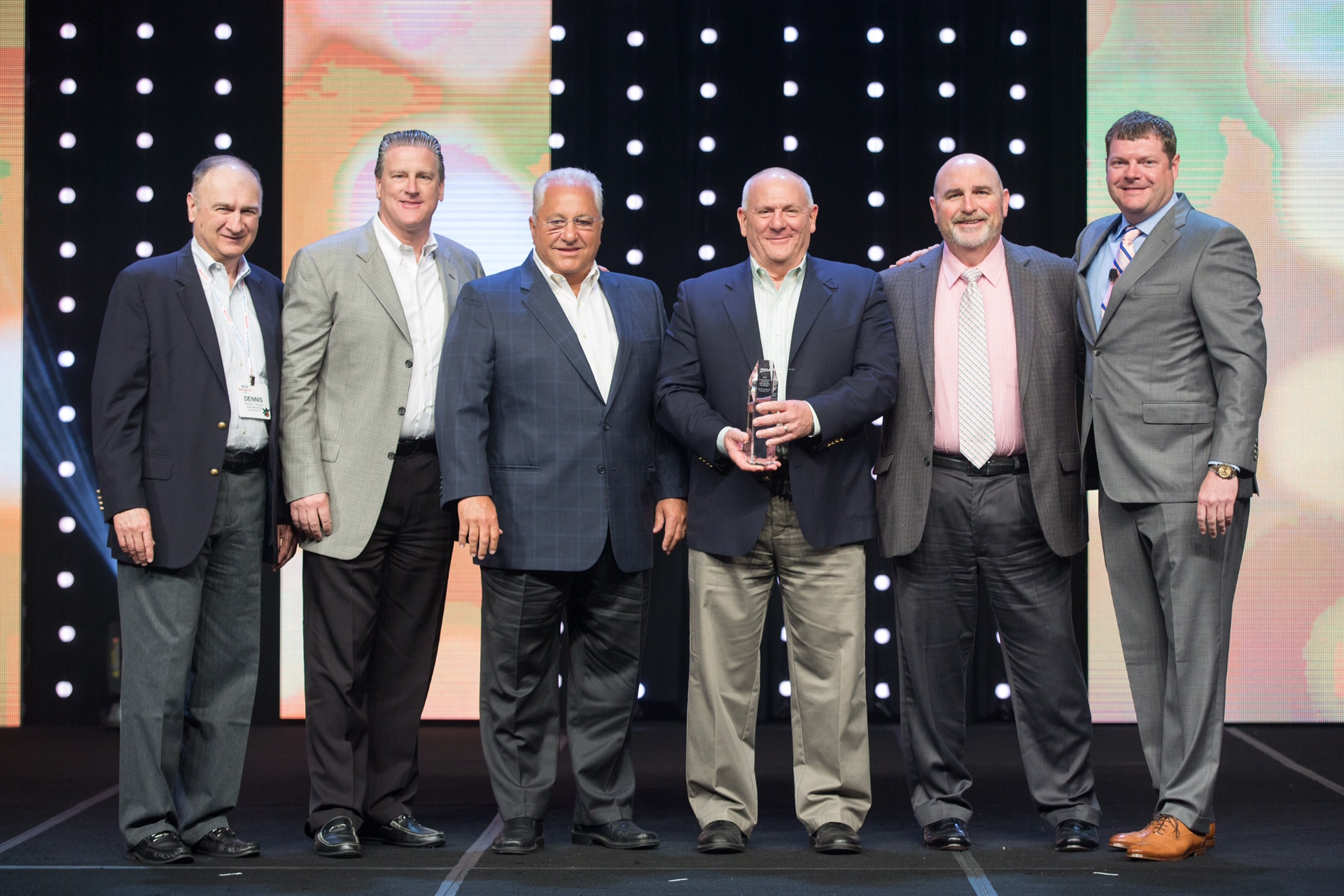 Left to right Dennis Shuman Chairman of the Management Methods Committee Steve Heiderstadt Robert Barbera John Losey holding the award and John Fanneron of the BP Group and Steve Dawson