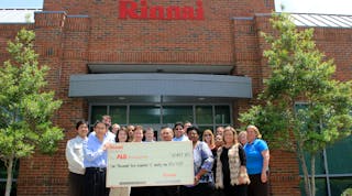 Rinnai America Corp. employees with their donation check.