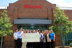 Rinnai America Corp employees with their donation check Rinnai America Corp employees with their donation check