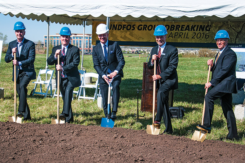 L to R Keith Copaken Principal Developer Copaken Brooks Lenexa KS Mayor Hon Michael Boehm Poul Due Jensen Grundfos Group Executive VP of Sales amp Marketing Terry Teach Grundfos USA Executive VP of Sales for Domestic Buildings Kirk Vigil Grundfos USA Director of National Accounts for Domestic Buildings