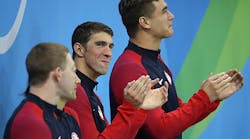 Gold medalist Michael Phelps of the United States celebrates on the podium during the medal ceremony for the Men&apos;s 4 x 100m Medley Relay Final on Day 8 of the Rio 2016 Olympic Games at the Olympic Aquatics Stadium on August 13, 2016 in Rio de Janeiro, Brazil. Image: Al Bello / Staff / Getty Images Sports