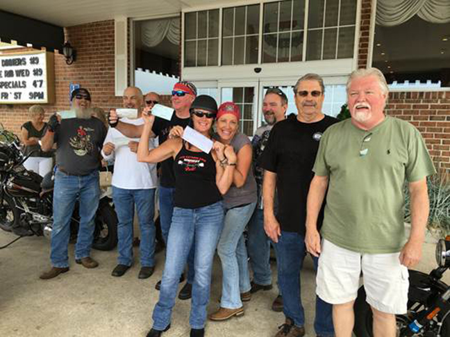 Motorcycle riders participating in OESP39s quotCare to Ridequot event