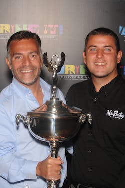 Vinnie Sposari and his son with the Top Gun Award Vinnie Sposari and his son with the Top Gun Award