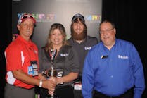 Members of the Mr Rooter Plumbing of San Antonio crew with the Rookie of the Year Award