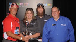Members of the Mr. Rooter Plumbing of San Antonio crew with the Rookie of the Year Award.