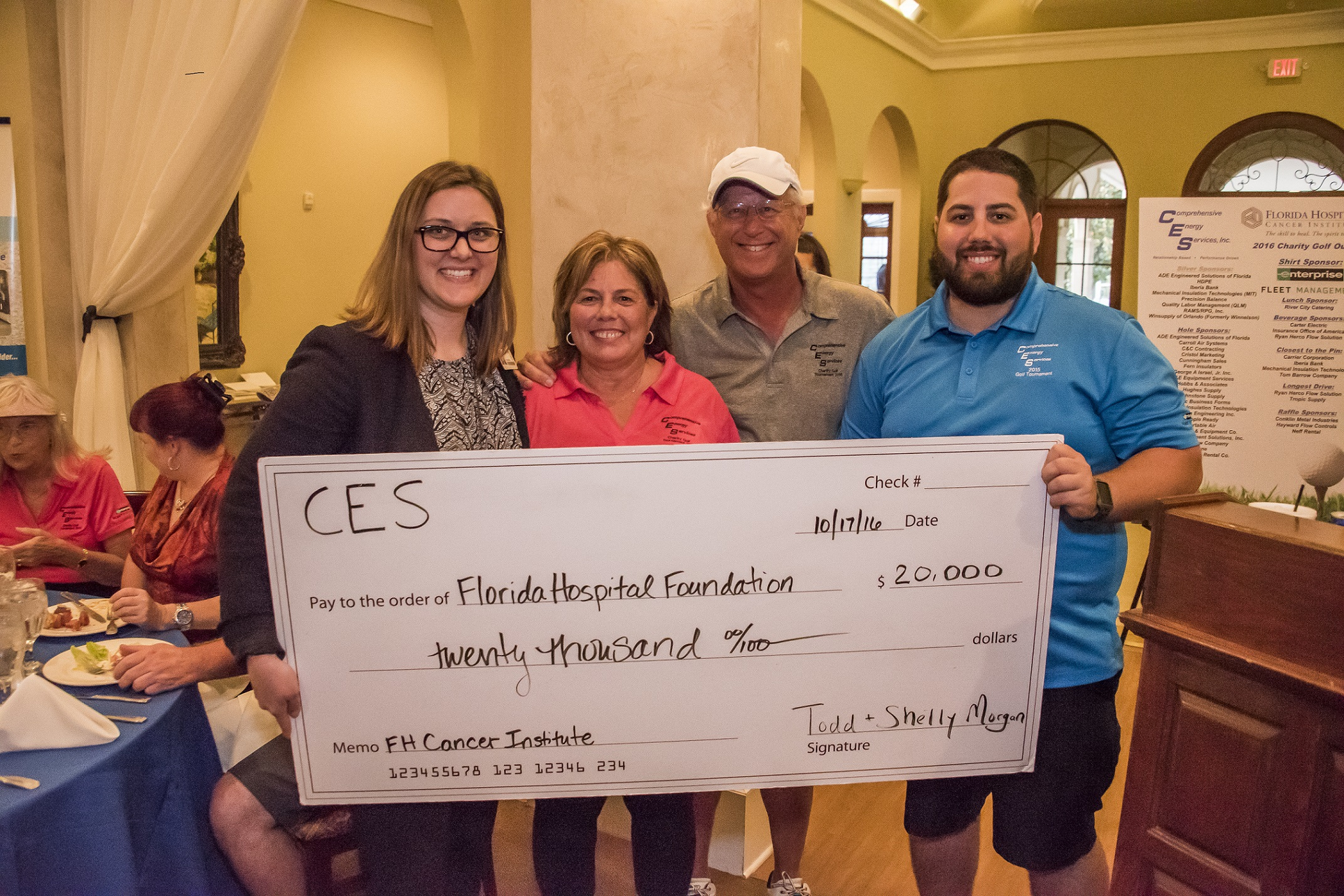 On October 17 Comprehensive Energy Services Inc presented a 20000 check to Florida Hospital Cancer Institute at the companyrsquos 10th Annual Charity Golf Tournament held at Alaqua Country Club Accepting the check from tournament hosts and company founders Todd and Shelly Morgan center was Cecilia Burnet left Development Officer for Florida Hospital Foundation Also pictured is son Michael Morgan