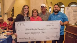 On October 17, Comprehensive Energy Services, Inc. presented a $20,000 check to Florida Hospital Cancer Institute at the company&rsquo;s 10th Annual Charity Golf Tournament held at Alaqua Country Club. Accepting the check from tournament hosts and company founders Todd and Shelly Morgan, center, was Cecilia Burnet, left, Development Officer for Florida Hospital Foundation. Also pictured is son Michael Morgan.