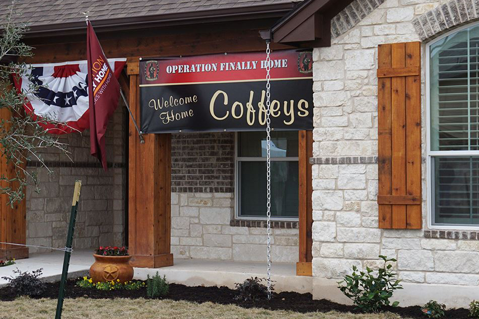 An OFH banner hangs on one of the newlycompleted homes