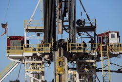 Workers stand on the platform of a fracking rig in the Permian Basin oil field on January 21 2016 in the oil town of Midland Texas Workers stand on the platform of a fracking rig in the Permian Basin oil field on January 21 2016 in the oil town of Midland Texas