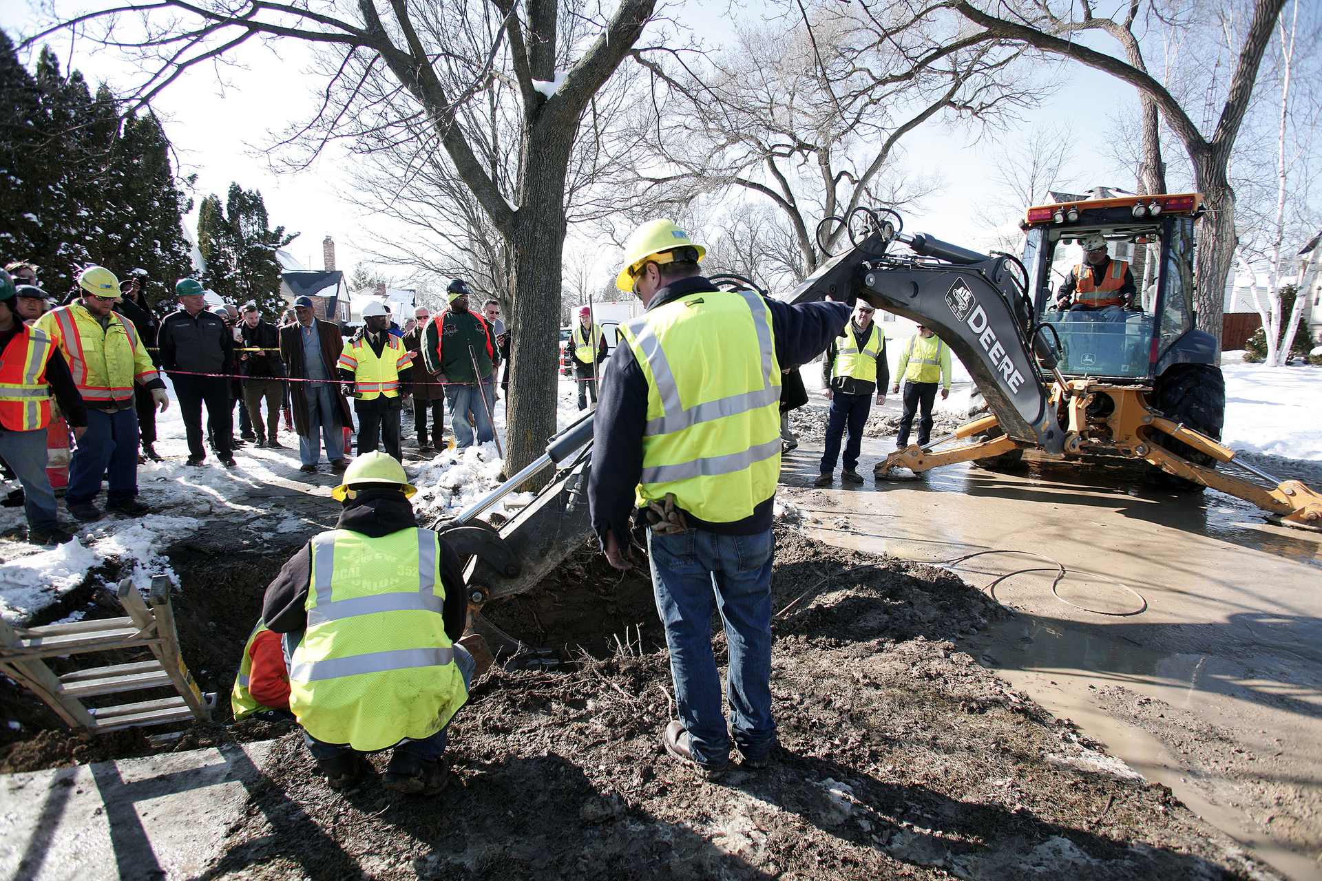 City of Flint Michigan workers prepare to replace a lead water service line pipe at the site of the first Flint home with high lead levels to have its lead service line replaced under the Mayor39s Fast Start program on March 4 2016 in Flint Michigan
