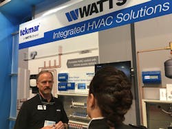 Discussing the latest in integrated solutions at the Watts booth Discussing the latest in integrated solutions at the Watts booth