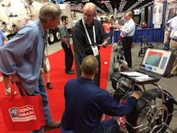 Electric Eelrsquos Joe McCann explains the features of the Cam Pro 2 to two WWETT Show attendees Electric Eelrsquos Joe McCann explains the features of the Cam Pro 2 to two WWETT Show attendees