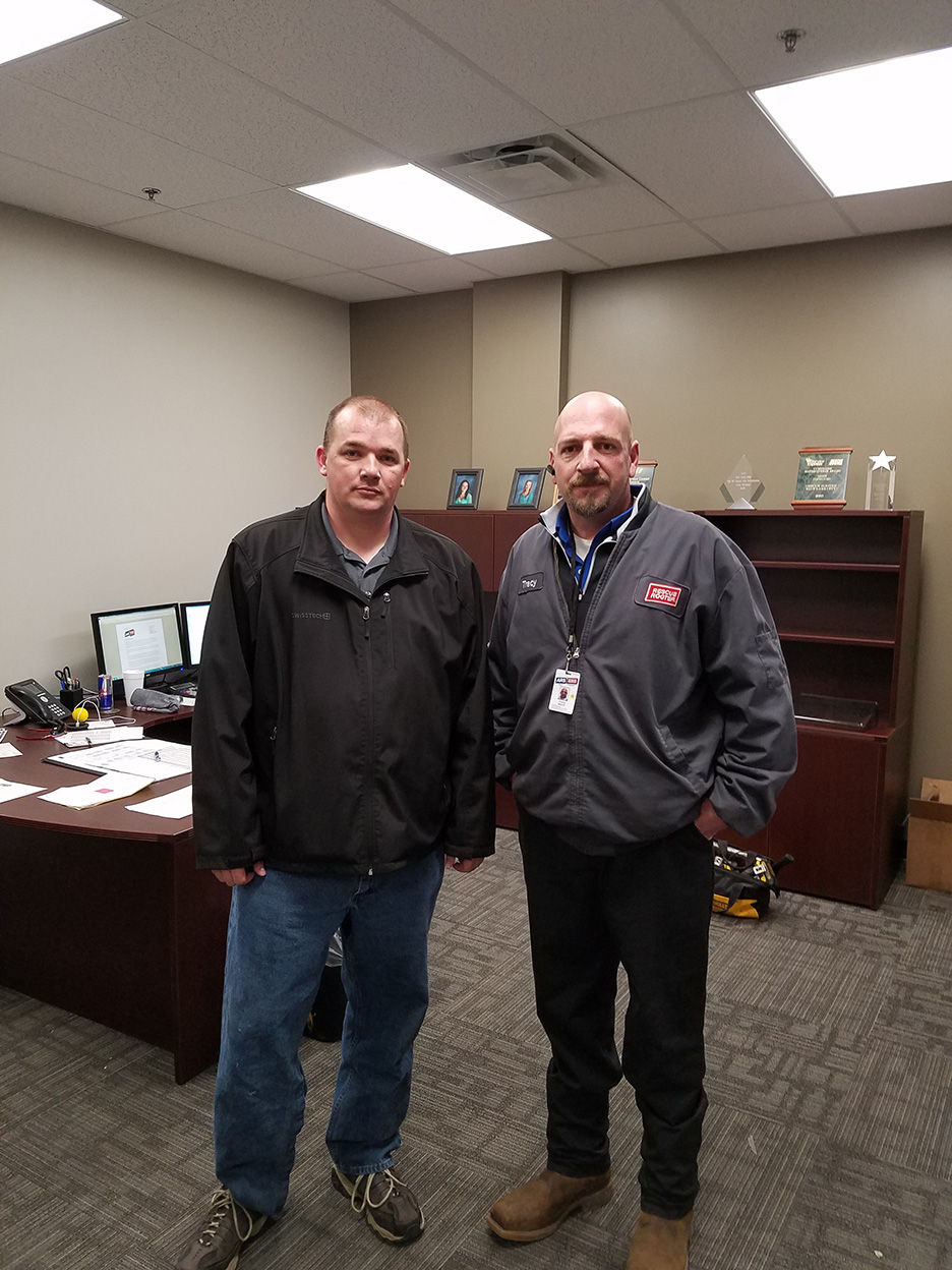 Veteran David Gardner left with Tracy Nevin General Manager Rescue Rooter