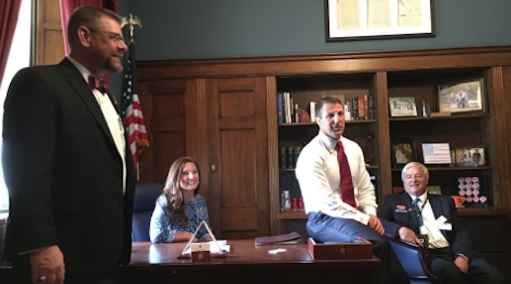 The contractors felt at home in the office of fellow contractor Rep. Markwayne Mullin. From left, PHCC-National Association Executive Vice President Michael Copp, Christie Mullin, Congressman Markwayne Mullin, and Arnie Rodio, Pace Setter Plumbing Inc., Sacramento, California.