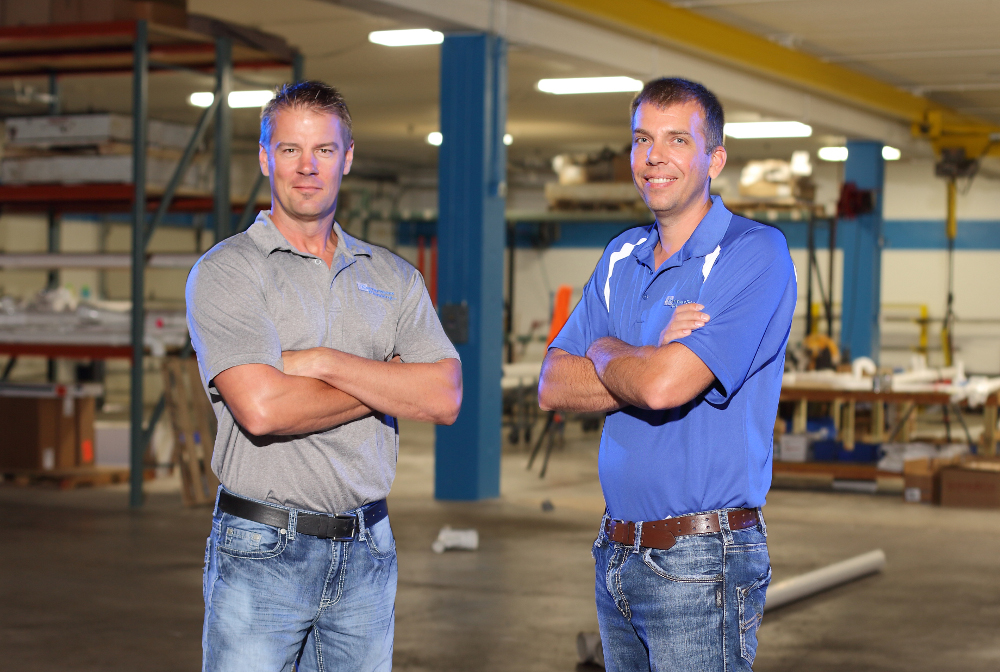 Jason Pampuch, left, and Steve Adkins, right, of Cornerstone Plumbing