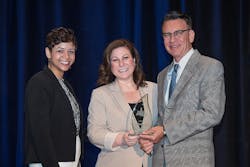 TDIndustries Chief People Officer Amy Messersmith (center) accepts the Torch Award for Ethics with Phylissia Clark (left) and Jay Newman (right) of the Better Business Bureau. TDIndustries Chief People Officer Amy Messersmith (center) accepts the Torch Award for Ethics with Phylissia Clark (left) and Jay Newman (right) of the Better Business Bureau.
