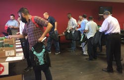 Gerber Plumbing and Danze employees assemble backpacks for school children in need Gerber Plumbing and Danze employees assemble backpacks for school children in need